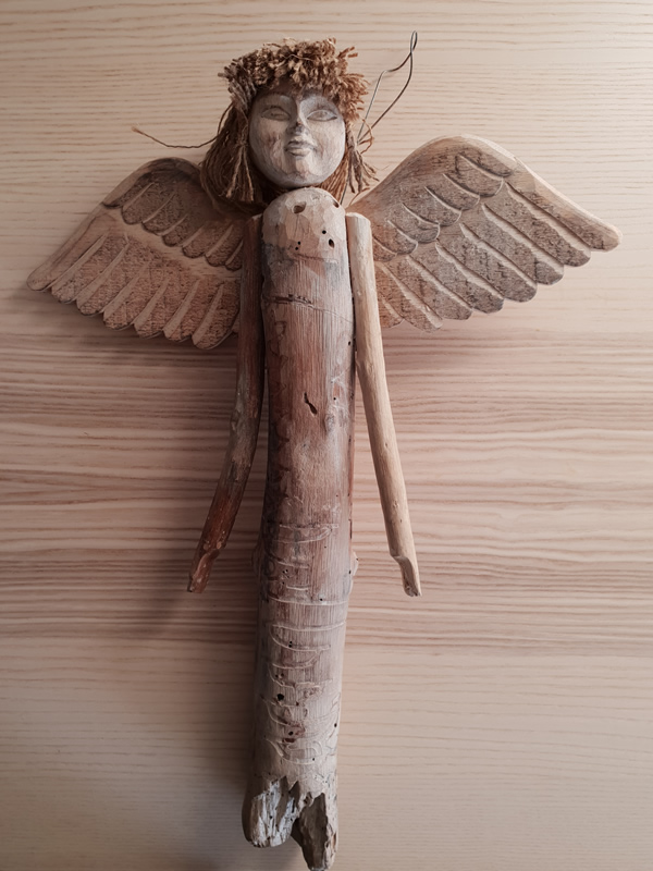 Wooden bali angels craftsmen handmade organic christmas sally bourne interiors london